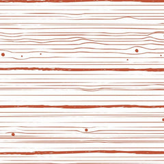 Gros plan de l'impression : une ligne terracotta tremblée qui s'épaissit, et un nœud de bois en ovale.