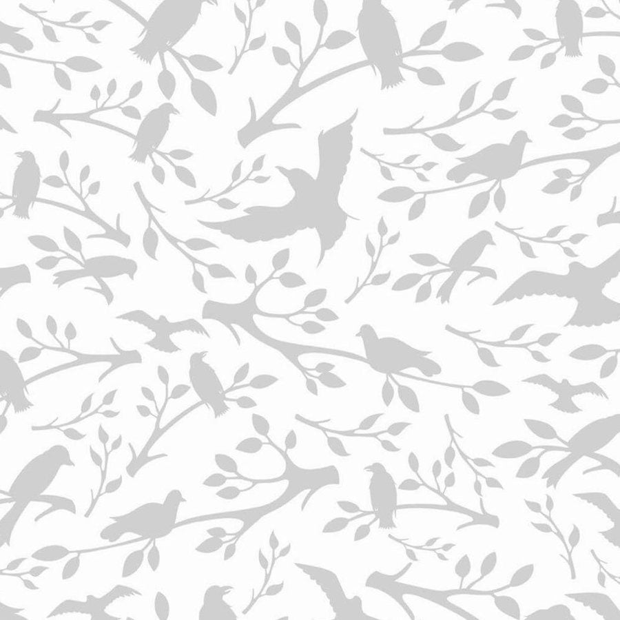 Gros plan de l'impression montrant la silhouette grise d'un oiseau et le contour des petites feuilles ovales
