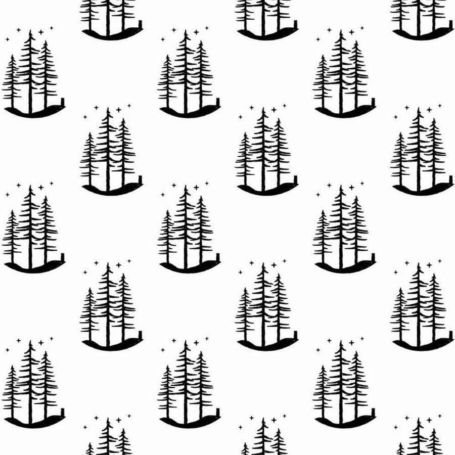 Gros plan de l'impression montrant les branches filiformes d'un bosquet noir et les points minuscules dispersés autour