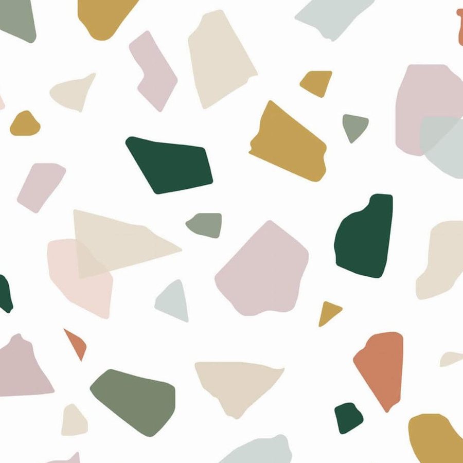 Gros plan sur l'impression, bords nets des éclats colorés et superpositions translucides.