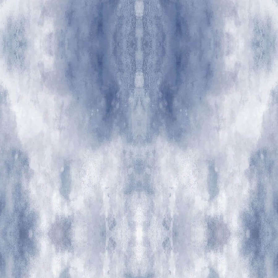 Gros plan de l'impression : fibres bleu-gris superposées et bord flou d'une masse de couleur.