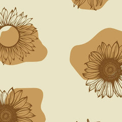 Gros plan sur le cœur strié d'un tournesol et le bord d'une tache ocre.