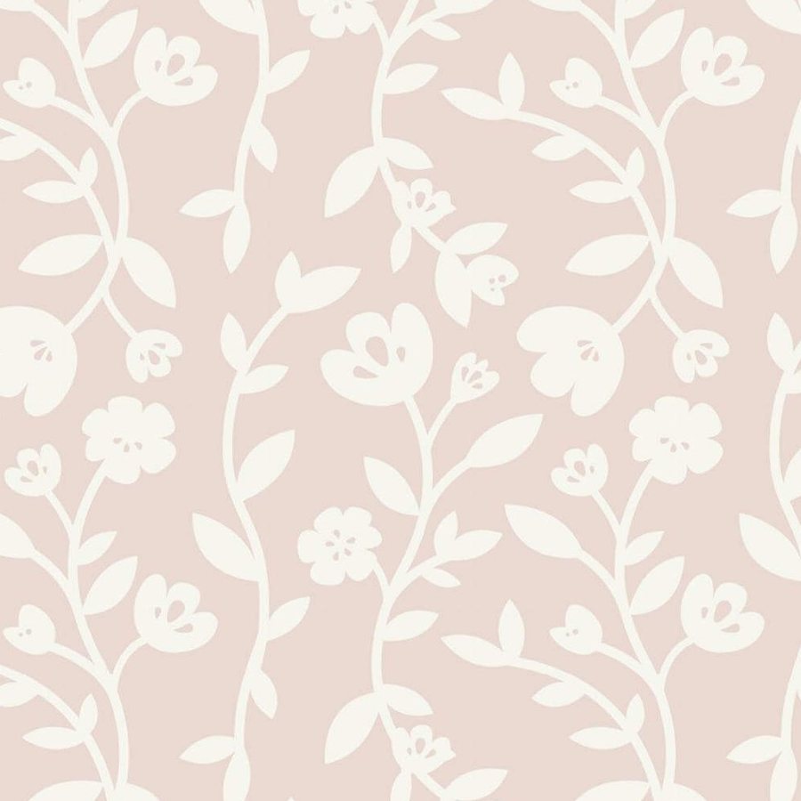 Gros plan de l'impression : pétales blancs arrondis et feuille ovale sur le fond rose poudré