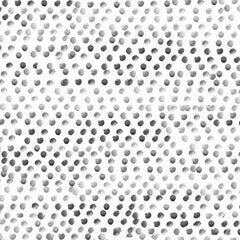 Gros plan de l'impression : quelques pois aux bords irréguliers, du gris pâle au gris foncé.