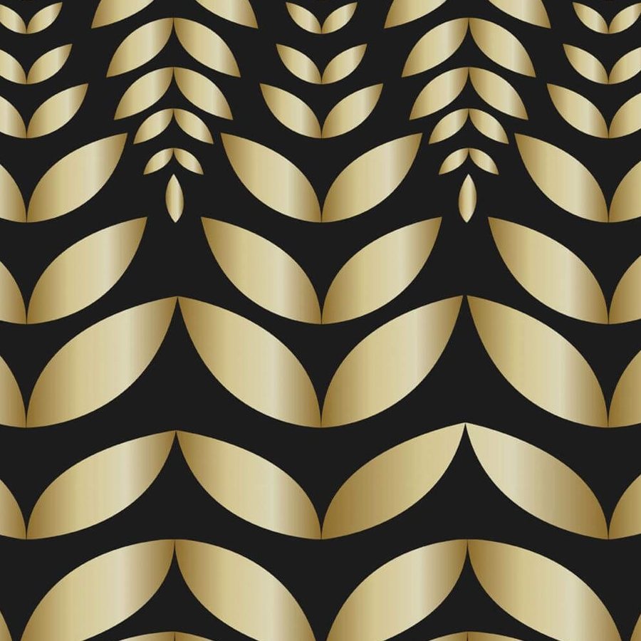 Gros plan de l'impression sur une feuille dorée, dégradé du beige au bronze contre le noir mat.