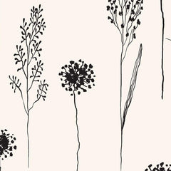 Gros plan de l'impression : le trait d'encre noire, tremblé et piqueté, sur le crème uni du fond.