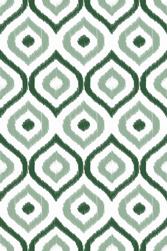 Le décor à plat : ogives vert bouteille et vert sauge aux contours effilochés sur fond blanc.