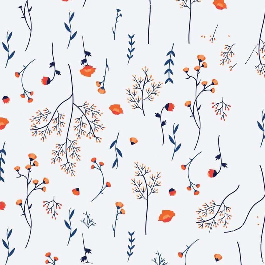 Gros plan sur l'impression : branche bleu marine, baies corail et petits points sur fond blanc