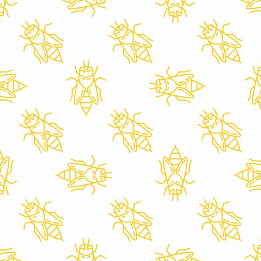 Gros plan sur l'impression : trait jaune doré d'une aile triangulaire et d'une antenne courbe sur le blanc.