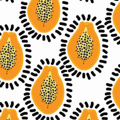 Gros plan de l'impression : graines noires dans la chair orange et traits épais de la couronne sur le fond blanc
