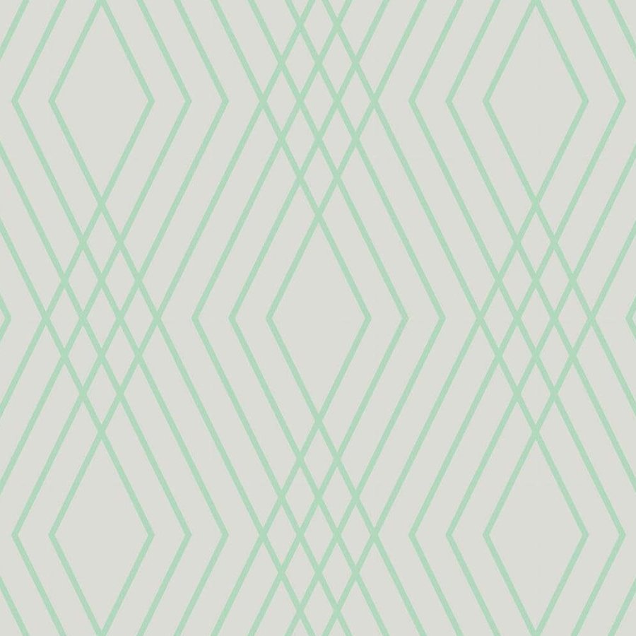 Gros plan sur l'impression : la pointe d'un losange où se croisent le trait vert d'eau et le trait gris, sur le fond perle.