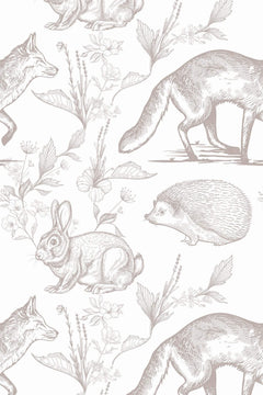 Le décor à plat : renard, lièvre, lapin et hérisson gravés en beige taupe sur fond blanc.