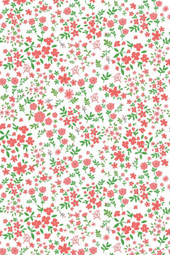 Le décor à plat : semis serré de petites fleurs corail et rose pâle avec feuillage vert vif sur fond blanc.