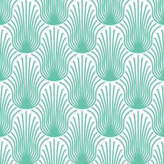 Gros plan sur l'impression : les lignes turquoise qui rayonnent depuis la goutte pleine d'une plume.