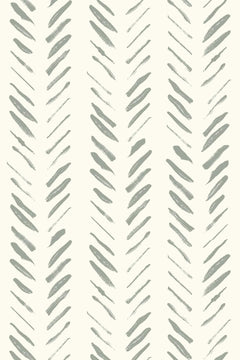 Le décor à plat : colonnes de traits de pinceau vert sauge en chevrons sur fond ivoire.