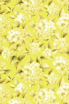 Le décor à plat : boules d'hortensia crème et feuillage jaune-olive sur fond jaune citron.