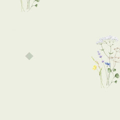 Gros plan sur l'impression : les tiges vertes d'un bouquet et un petit losange gris à côté.