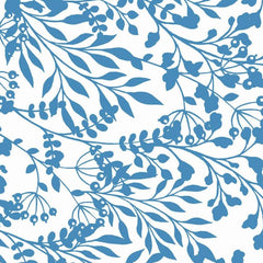 Gros plan de l'impression : une grappe de baies bleues et le contour plein des petites feuilles.