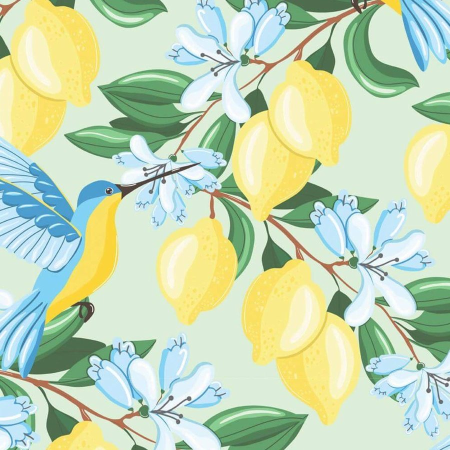Gros plan de l'impression : un citron jaune et sa feuille cernée d'un trait fin, sur le fond vert amande légèrement grainé.