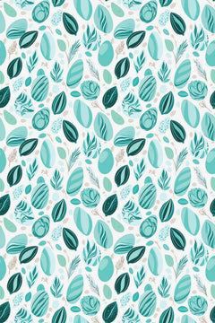 Le décor à plat : feuilles, galets et branches turquoise, vert d'eau et vert sapin serrés sur fond blanc