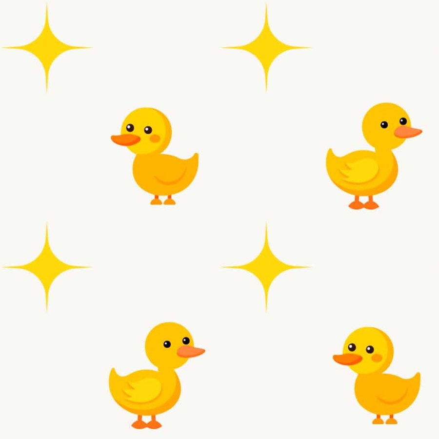 Gros plan sur l'impression : le jaune plein d'un caneton, son œil noir et la branche d'une étoile.