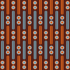 Gros plan sur l'impression : un cercle concentrique blanc, orange et bleu.