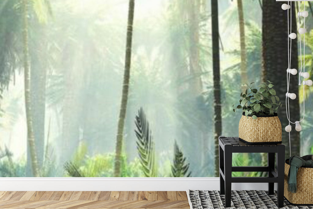 Papier peint panoramique Palmeraie tropicale — jungle vert tendre et brume