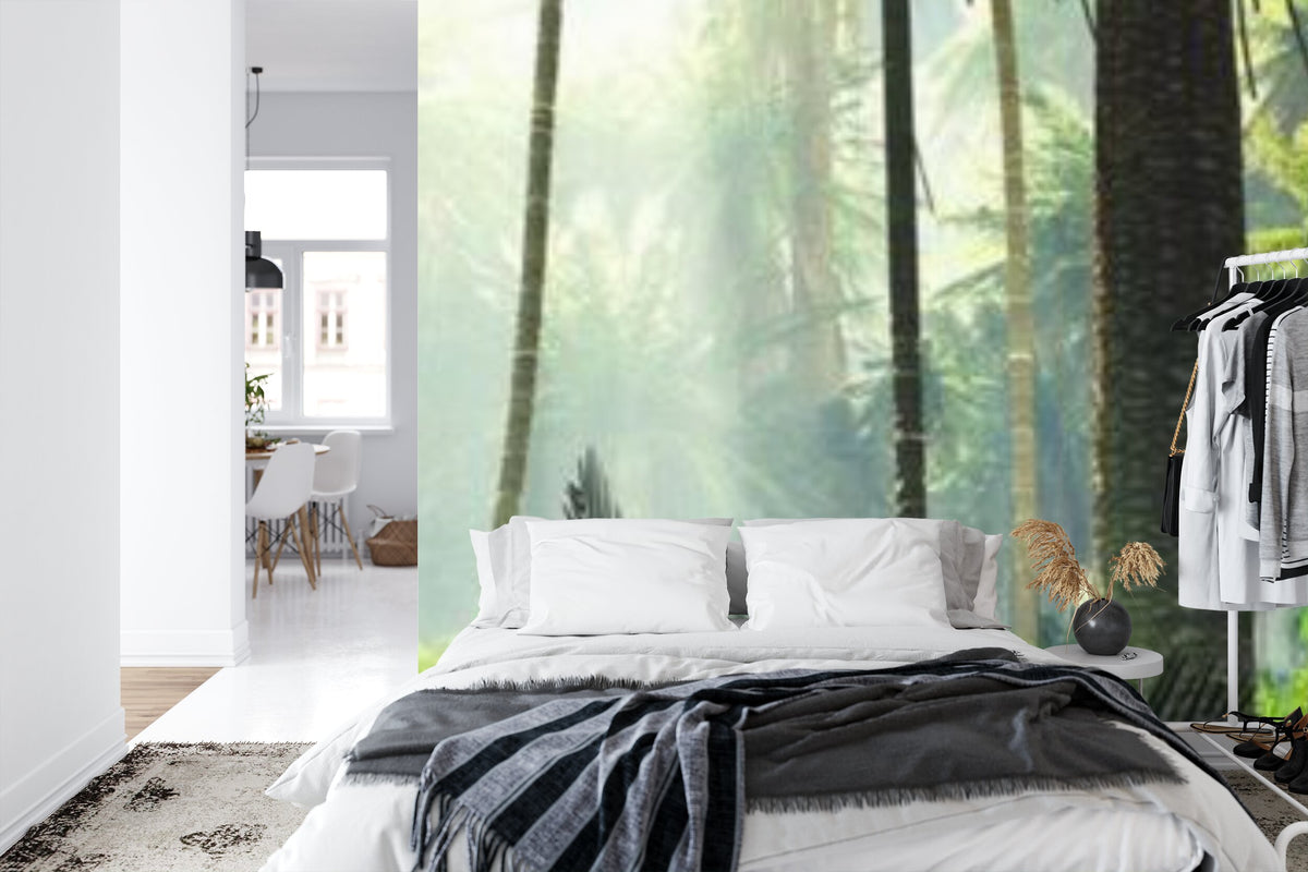 Papier peint panoramique Palmeraie tropicale — jungle vert tendre et brume