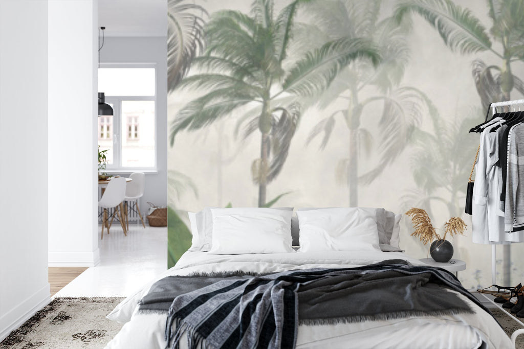 Papier peint panoramique Palmeraie brumeuse — paysage tropical vert amande